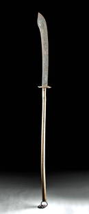 Early 20th C. Chinese Steel Pudao Wooden Hilt: East Asia, China, Qing Dynasty, ca. early 20th century CE. An elegant pole weapon known as a pudao (or podao) presenting with a lengthy, wooden hilt, and a curved, steel blade. The broad single-edged