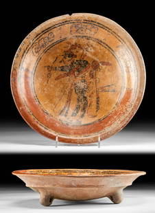 Maya Polychrome Tripod Dish Dancing Shaman: Pre-Columbian, Maya Territories, Early Classic Period, ca. 300 CE. An impressive pottery dish with a circular flared rim and shallow basin on three petite feet. Painted in shades of black and russet