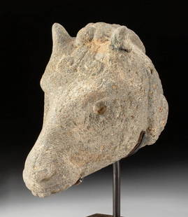 Maya Basalt Head of Mountain Goat, Von Winning COA: Pre-Columbian, Guatemala, Classic Period, Maya, ca. 250 to 900 CE. Finely carved from basalt, the head of a baby goat with petite horns; long drooping ears with incised scroll motifs along the lower