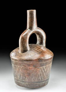 Chavin Pottery Stirrup Vessel, Incised Geometric Design: Pre-Columbian, North Coast Peru, Chavin, ca. 1200 BCE. A beautiful mold-made earthenware stirrup vessel presenting a circular, rounded base and impressively thin walls that flare outwards to a convex