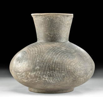 Mississippian Incised Pottery Vessel w/ TL: Native American, Southeastern United States, Arkansas, Mississippian, ca. 1200 to 1400 CE. A beautiful blackware vessel that rests on a small foot with a squat and spherical body. The neck flares up