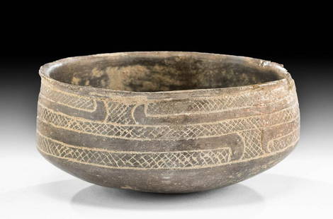 Mississippian Caddo Incised Pottery Bowl: Native American, Midwest to Southeastern United States, Caddo / Mississippian, ca. 1200 to 1800. A fine hand-built pottery bowl displaying a round yet stable base and impressively thin walls that