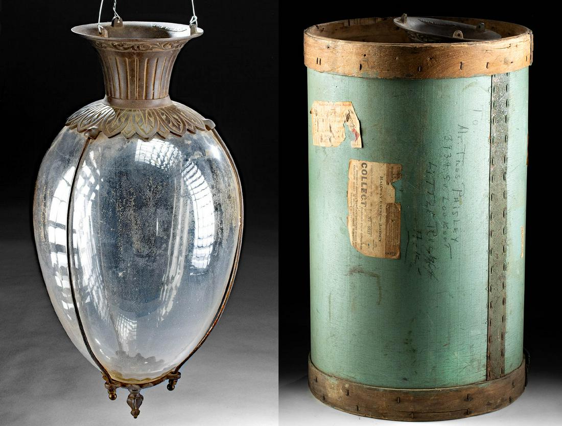 Late 19th C. Iron & Glass Apothecary Show Globe: Western Europe or United States, ca. 1891 CE. A fabulous glass and iron show globe with a wooden case from 1946 that was created for shipping. The globe has a beautiful iron pedestal with foliate desi