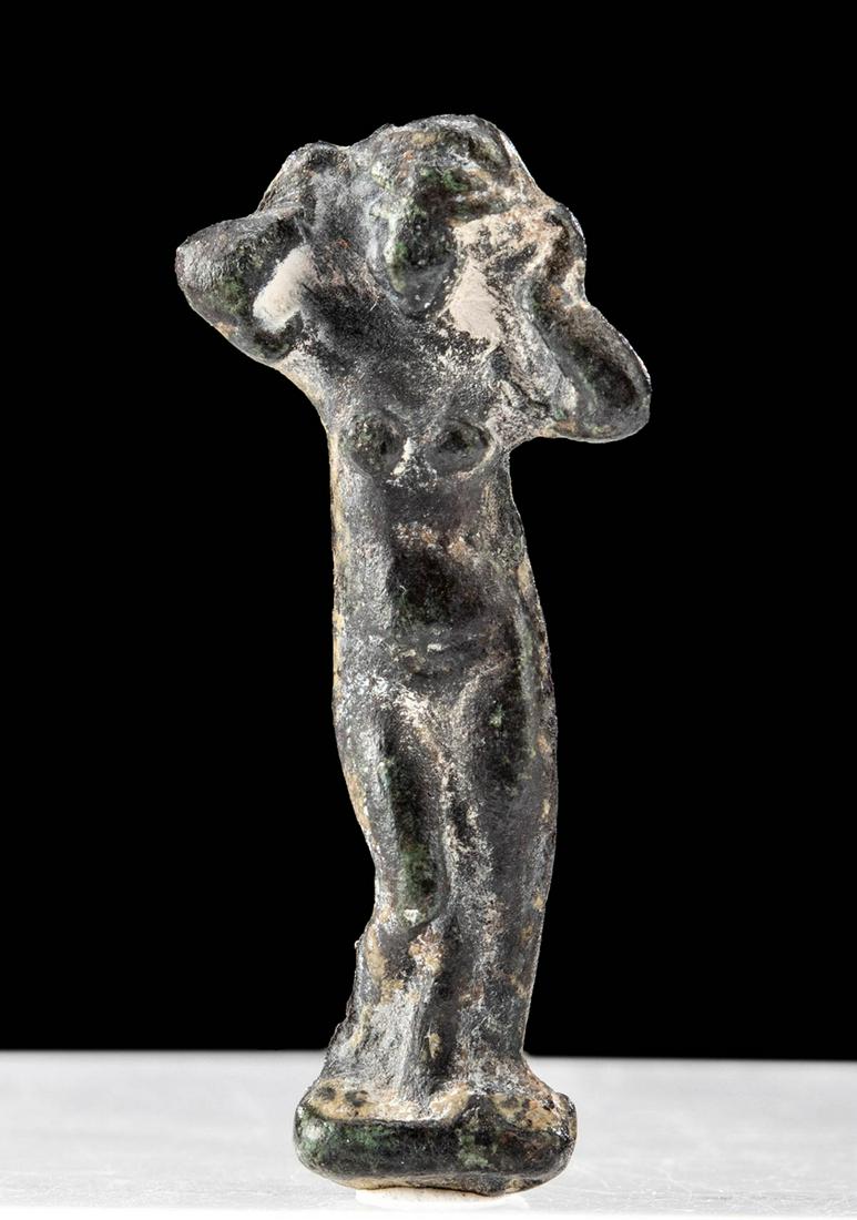 Roman Leaded Bronze Standing Venus Pendant: **First Time At Auction** Roman, Imperial, ca. 1st to 3rd century CE. A gorgeous leaded bronze pendant of Venus, the Roman goddess of beauty and love, cast using the lost wax (cire perdue) process. Th