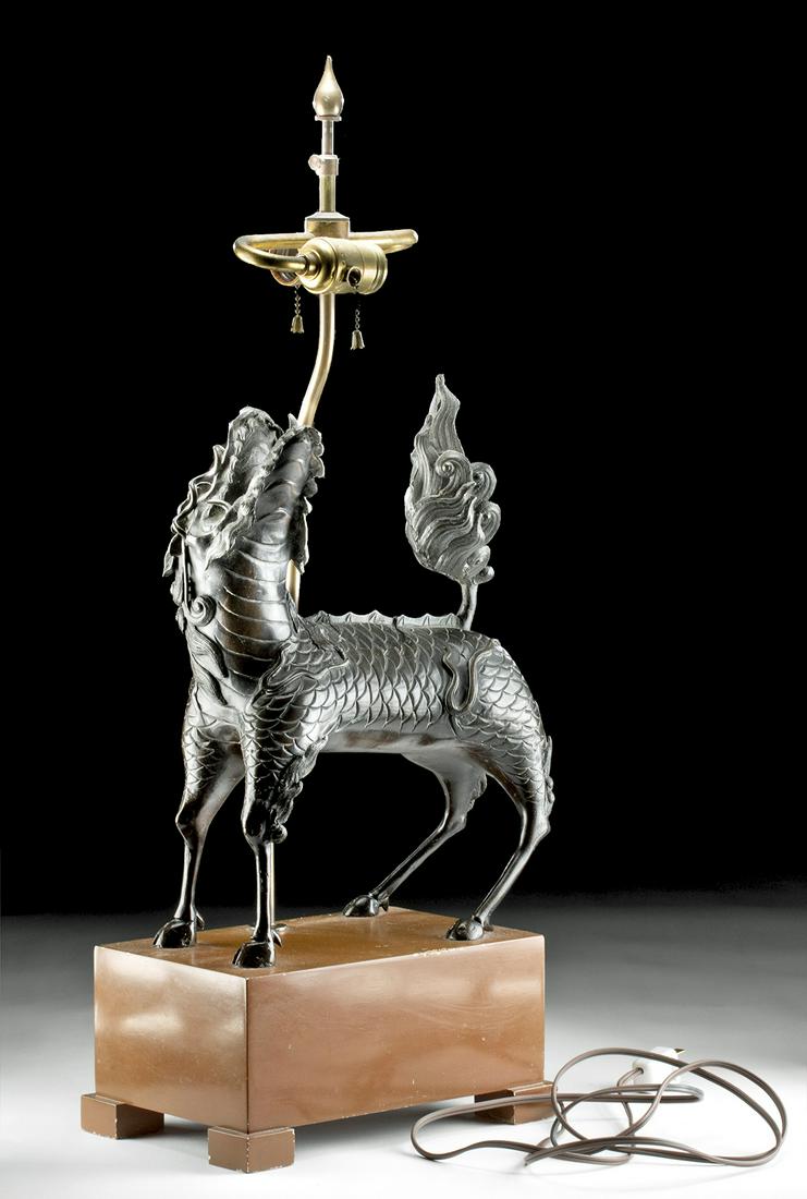 19th C. Japanese Meiji Bronze Kirin - Lamp Form: East Asia, Japan, Meiji period, 19th to early 20th century CE. A fantastical bronze sculpture of a mythical qilin or kirin that has been converted into a working lamp! The chimeric animal features spi