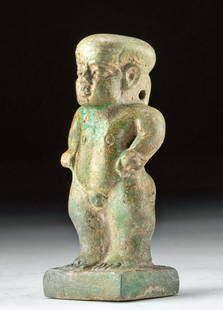 Egyptian Glazed Faience Pataikos Pendant: Egypt, Late Dynastic to Ptolemaic Period, ca. 664 to 30 BCE. A mold-formed faience figure depicting Pataikos, the bow-legged dwarf god meant as a protector deity and a mitigator of violent natural