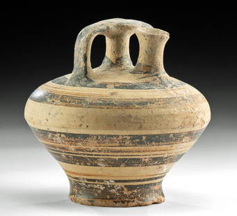 Mycenaean Pottery Spouted Stirrup Jar w/ Banded Motif: Ancient Greece, Mycenaean Period, Late Helladic II to Late Helladic IIIB period, ca. 1450 to 1200 BCE. An attractive, wheel-thrown pottery jar with a carinated circular body resting atop a squat,