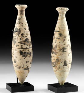 Pair of Corinthian Pottery Alabastra w/ Birds & Sirens: Greece, Corinth, Archaic Period, ca. 6th to 5th century BCE. A gorgeous pair of ceramic alabastra, both boasting elegant forms with a pointed base, an elongated body, a slender, conical neck, and an a