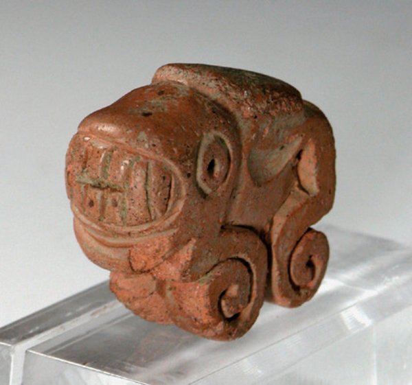 Pre-Columbian Recuay Jaguar Amulet: Interesting miniature form... Ancient Pre-Columbian Amulet, Recuay culture, ca. 200 to 600 A.D. Redware pottery in the shape of a jaguar with a big toothy grin; nicely-carved features/detailing. 1-3/8