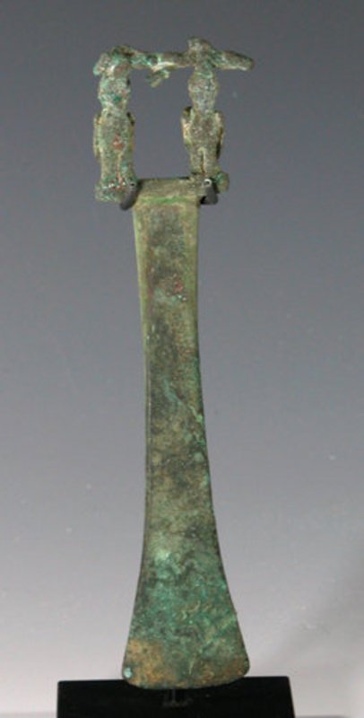 Inca Copper Tumi - 2 Birds Catching Fish: Pre-Columbian Tumi from ancient Peru, Inca culture, ca. 1400 – 1500 A.D. Cast and hammered solid copper knife / ceremonial blade featuring two birds catching fish. Custom stand. 5-1/4"H. PROVENANCE: