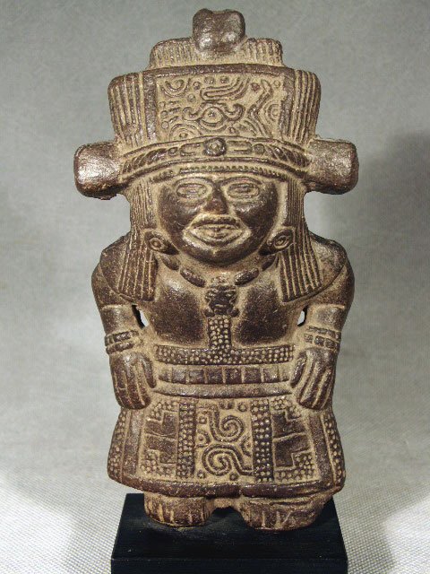 Great Vera Cruz Mold-Made Whistle: Ancient Pre-Columbian Whistle, Veracruz, Mexico, ca. 600 to 900 AD. Mold-made blackware pottery, multi-tone whistle. Extraordinary detailing. 8"H, custom stand. PROVENANCE: Purchased legally from a pr