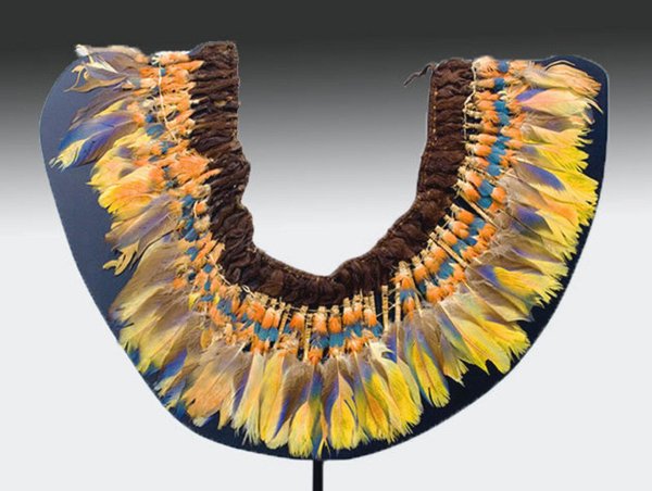 Peruvian Proto Nazca Feather Necklace Collar: Ancient Pre-Columbian Feather Collar from the southern coast of Peru, ca. 100 B.C. - 100 A.D. Constructed with woven wool, human hair and vibrant parrot feathers that are linked by a small cord. 20"H