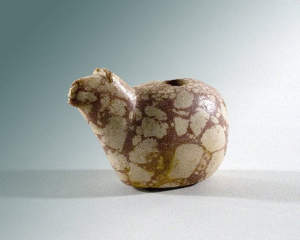 Pre-Columbian Inca Stone Canopa: Ancient Pre-Columbian Stone Canopa from the highlands of Peru, Inca culture, ca. 1200 - 1500 A.D. A carved terracotta and cream hard stone example depicting a llama having stylized geometric features.
