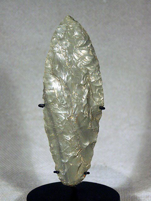 Perfect Colima Green Obsidian Knife - Rare!: Ca. 200 BC - 200 AD. A great Colima knife made from obsidian (Volcanic glass). Custom steel stand, Razor sharp edges and great deposits on surface, 7-1/2"L PROVENANCE: Ex-private California Collection