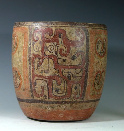 Mayan Peten Polychrome Cylinder: Ancient Pre-Columbian Mayan Polychrome Cylinder from the Peten Valley, Guatemala, ca 500 to 800 A.D. Typical cylinder form with slightly-flaring walls decorated in shades of red, orange and black with
