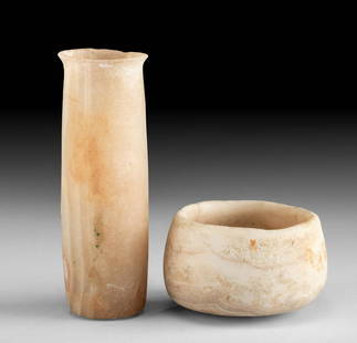 Fine Pair of Egyptian Banded Alabaster Vessels: Ancient Egypt, Old Kingdom, 3rd to 6th Dynasty, ca. 2686 to 2181 BCE; Late Dynastic Period, 26th to 31st Dynasty, ca. 664 to 332 BCE. A gorgeous pair of hand-carved alabaster jars. Boasting natural
