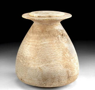 Rare Egyptian Alabaster Lidded Jar - Piriform Shape: Egypt, Late Dynastic Period, 26th to 31st Dynasty, ca. 664 to 332 BCE. A splendid piriform jar, hand-carved from sandy-beige alabaster with pale peach and creamy white spotted and banded inclusions.