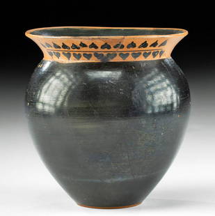 Greek Attic Pottery Mastoid Cup: Ancient Greece, Athens (Attic), ca. 500 to 450 BCE. An outstanding Attic mastoid cup presenting a narrow, circular base and impressively thin walls that spread outwards to a rounded shoulder, a