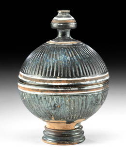 Greek Gnathian Painted Pottery Pyxis: Magna Graecia, South Italy, Apulia, Gnathian, ca. late 4th century BCE to 3rd century BCE. A jaw-dropping pottery lidded pyxis, boasting a body of nearly perfect spherical form enveloped in black