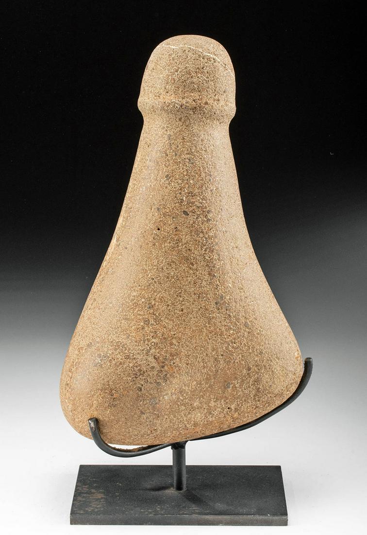 19th C. Hawaiian Basalt Poi Pounder - Phallic Form: North Pacific, Hawaii, ca. 19th century CE. A sizable and splendid poi pounder, hand-carved from basalt in mottled hues of tan and grey. Presenting an overall phallic form, the fine implement displays