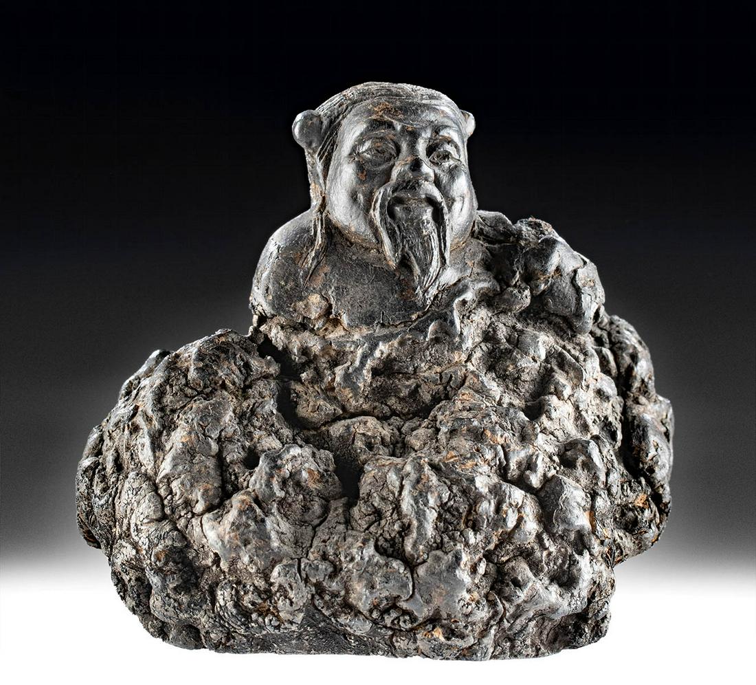 Antique Japanese Meiji Wood Burl Figure: East Asia, Japan, Meiji period, ca. late 19th to early 20th century. A charming figure carved from a wood burl, with just his torso rising from the top. The burl is a natural formation on a tree trunk