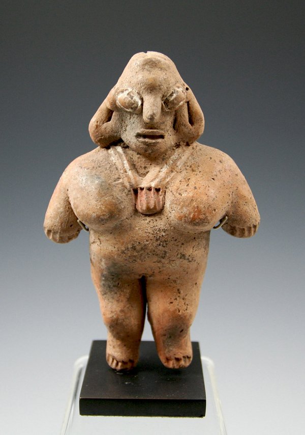 A Michoacan "Pretty lady" Figure: From Pre-Columbian West Mexico, circa 300 B.C. - 100 B.C. Measuring approximately 4" tall by about 2 1/2" wide (unmounted), and about 4 1/4" tall mounted, this example depicts a broad-shouldered femal