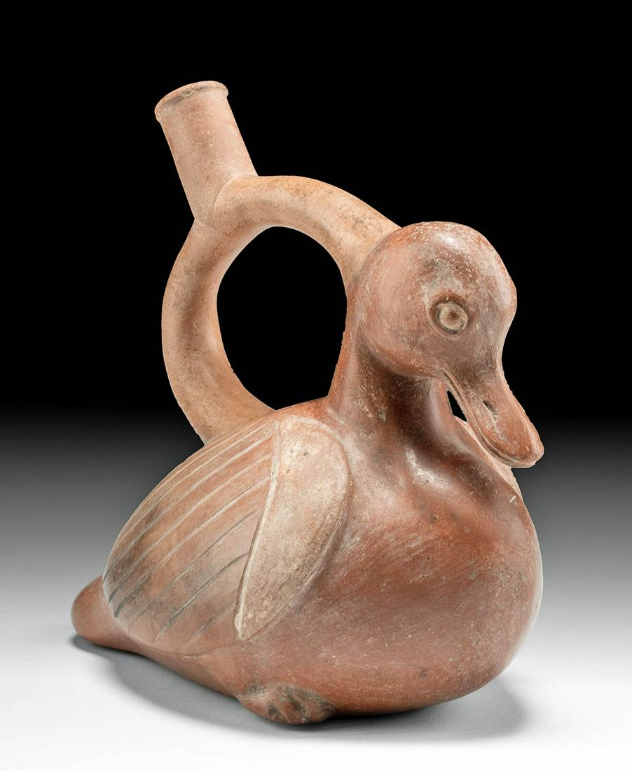 Moche Bichrome Muscovy Duck Vessel w/ TL, ex-Museum: Pre-Columbian, North Coast Peru, Moche, late Phase 1 to Phase 2, ca. 250 to 400 CE. A charming example of a hand-built pottery vessel in the form of a seated Muscovy duck. Highly burnished and adorned