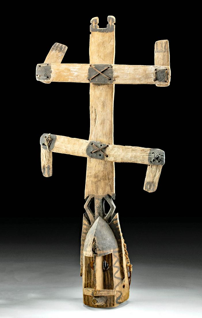 Large Mid 20th C. Dogon Kanaga Wood Mask - Art Loss: West Africa, Mali, Sanga region, Dogon people, ca. 1940s CE. A classic example of one of the most striking Dogon artifacts, a highly abstract mask known as a "kanaga", adorned with white and black pai