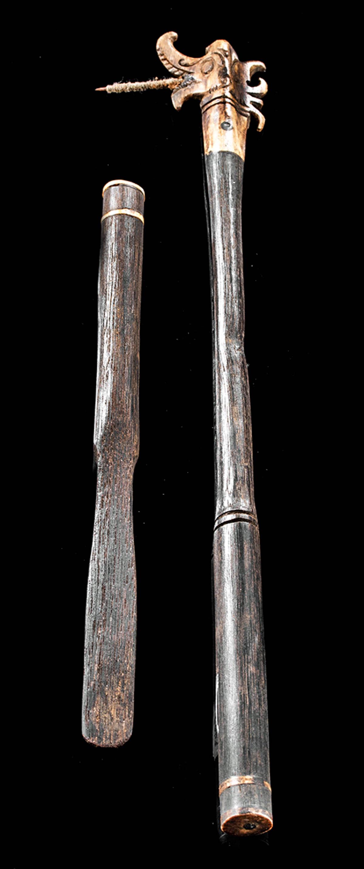 Early 20th C. Dayak Wood / Bone Tattoo Set - Dragon: Indonesia, Borneo, Central Kalimantan, Dayak peoples, ca. early 20th century CE. Two hand-carved Dayak wooden (likely ironwood) and deer bone tattoo tools. One features a handsome dragon finial carved