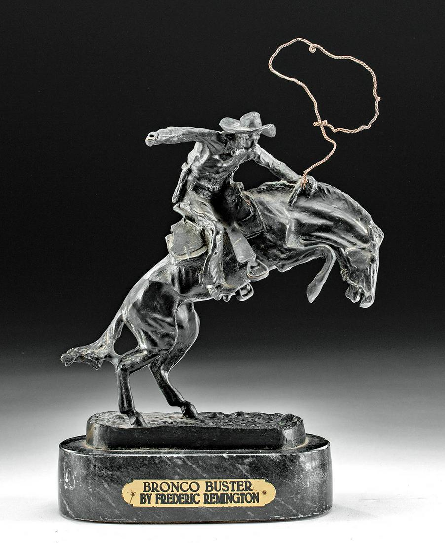 20th C. Remington Brass "Bronco Buster" Recast: Frederic Remington (American, 1861 to 1909). "Bronco Buster" brass, late 20th century. Signed on integral base. A stunning brass statue of a rearing bronco and rider. The action-packed piece shows the