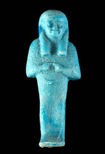 Egyptian Third Intermediate Glazed Faience Ushabti: Ancient Egypt, Third Intermediate Period, 21st to 25th Dynasty, ca. 1070 to 664 BCE. A mold-formed faience ushabti of a petite and finely decorated form. The slender figure stands in mummiform with