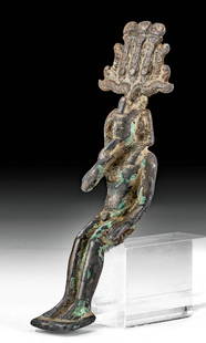 Fine Egyptian Bronze Seated Harpokrates: Egypt, Ptolemaic period, ca. 332 to 30 BCE. A solid cast-bronze figurine depicting the child god Harpokrates, from the Egyptian "Her-pa-khered," literally "Horus the Child," seated nude with bent