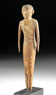 Egyptian Middle Kingdom Wood & Gesso Striding Figure: Ancient Egypt, Middle Kingdom, 11th to 13th Dynasty, ca. 2130 to 1649 BCE. A wonderful example of a hand-carved wooden male figure, perhaps a servant in a tomb scene depicting events from everyday lif