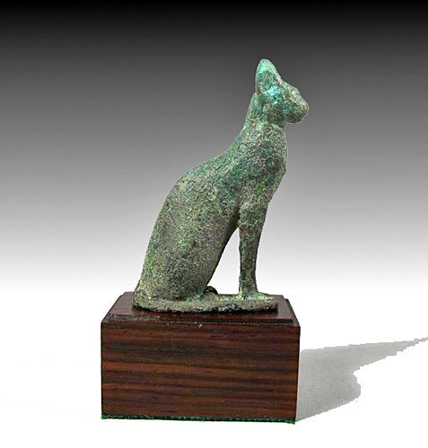 An Egyptian Bronze Figure of a Cat