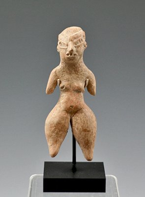 A Tlatilco Standing Figure, Pre-Classic Mexico: D-1 Type Tlatilco standing figure from Pre-Classic Mexico, ca. 1200 - 500 B.C. This example measures approximately 4-1/4" tall (unmounted, item alone), of the variant that exhibits mask-like facial fe