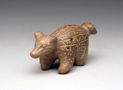 A Colima Whistle of A Coatamundi: Colima, Mexico ca. 500 BC - 500 AD. Brownware pottery musical instrument; incised detailing. Makes very sweet sounds! 1-1/2"H x 3-1/2" x 1-1/2"W. Provenance: ex-private NYC collection. no reserve