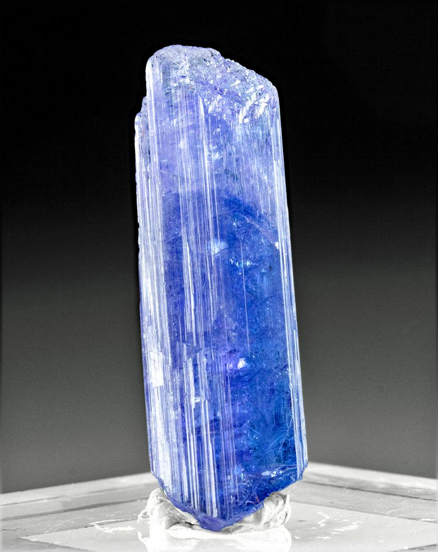 Stunning Tanzanite Crystal Terminal w/ Violet Hues: Central Africa, Tanzania, ca. 585 million years ago. This is a stunning tanzanite gemstone, the rare blue variety of zoisite that is only found in Tanzania. Tanzanite is naturally trichroic with hues 
