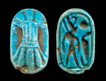 Large Egyptian Glazed Faience Seal Figure & Uraeus: Ancient Egypt, New Kingdom to Third Intermediate Period, 19th to 25th Dynasty, ca. 1292 to 664 BCE. A mold-formed faience stamp seal of ovoid form with interesting imagery incised on the stamp face.