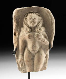 Romano-Egyptian Terracotta Plaque Nude Concubine: Egypt, Romano-Egyptian, ca. 1st to 2nd century CE. A lovely pottery relief of a standing female concubine depicted nude, save for a tripartite headdress, a necklace, and bangles on each wrist.