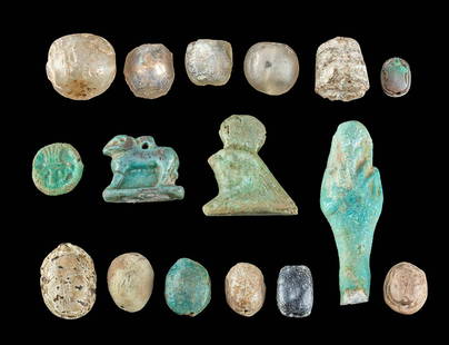 Egyptian Faience, Stone, & Glass Assortment, 16 pcs: Ancient Egypt, New Kingdom to Romano-Egyptian Period, ca. mid-16th century BCE to 2nd century CE. A lovely ensemble of 16 ancient Egyptian artefacts made from faience, glass, or stone. From the New Ki