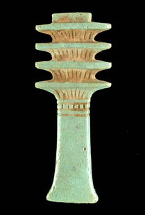 Large Egyptian Glazed Faience Djed Pillar Pendant: Egypt, Late Dynastic Period, 26th to 31st Dynasty, ca. 664 to 332 BCE. A wonderful example of a mold-formed djed pillar pendant of sizable form with a gently flared foot, a tiered upper body, and a su