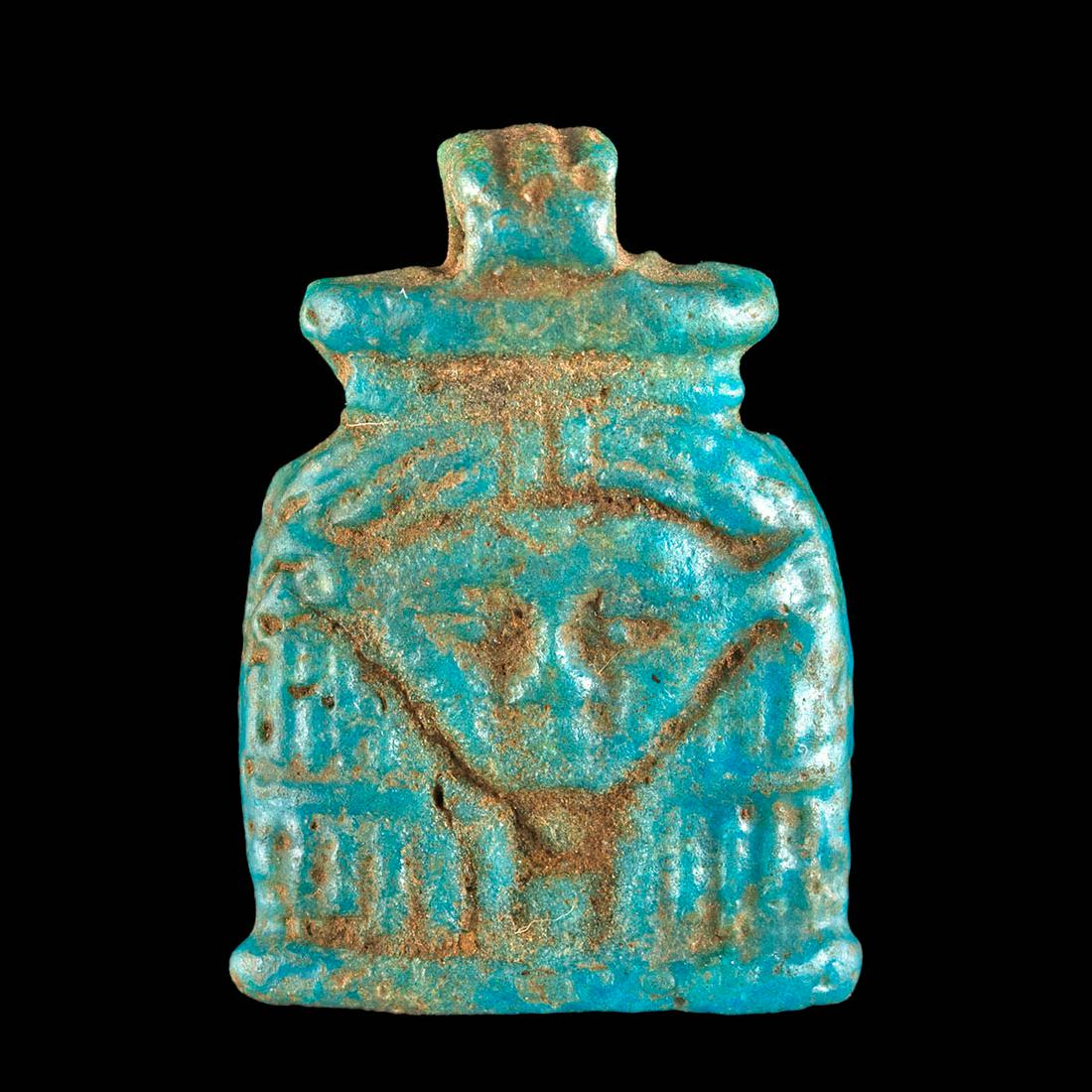 Egyptian Glazed Faience Hathor Pendant: Ancient Egypt, late Third Intermediate to Late Dynastic Period, 25th to 30th Dynasty, ca. 744 to 343 BCE. A mold-formed faience pendant depicting Hathor, the goddess of music, love, dance, and motherh