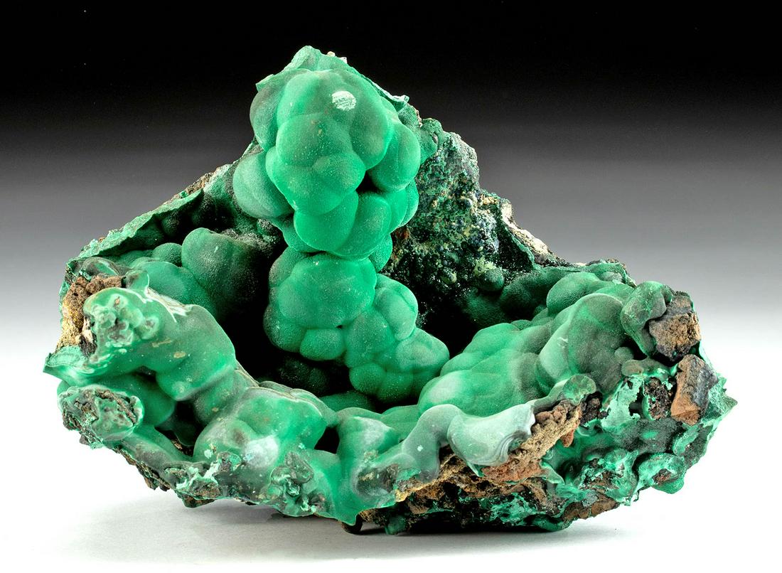 Beautiful Natural Malachite Botryoidal Mass: Central Africa, Democratic Republic of the Congo, ca. millions of years ago. This is a lovely natural malachite mineral with unusual bubbly crystalline structures known as botryoidal masses. Malachite