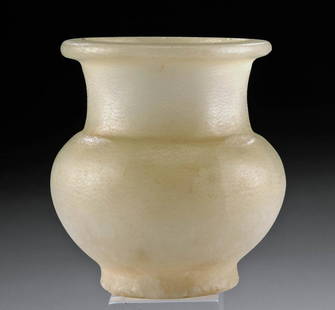 Egyptian New Kingdom Alabaster Cosmetic Jar: Egypt, New Kingdom Period, mid-18th Dynasty, ca. 1492 to 1425 BCE. Expertly carved from beautiful alabaster, this is a choice cosmetic vessel with an exceptionally thin body - well executed and of