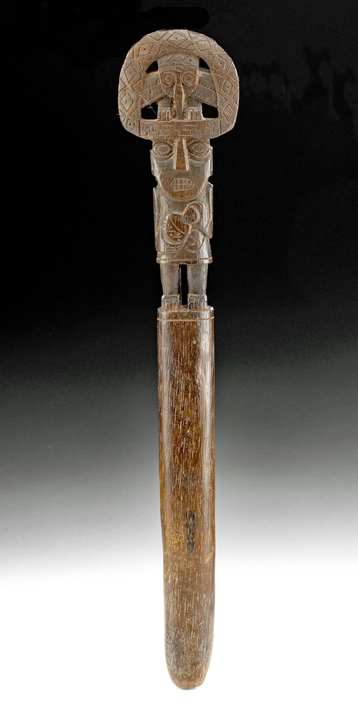 Chimu Wood Staff Finial w/ Standing Lord Figure: Pre-Columbian, North Coast Peru, Paramonga region, Chimu, ca. 1200 to 1400 CE. This is a beautiful hand-carved wooden handle or finial for a royal staff or scepter surmounted with a fine chieftain or 