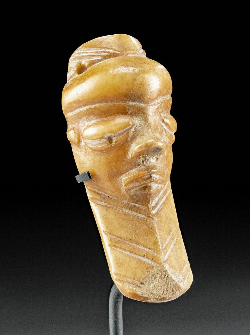 Early 20th C. African Pende Bone Ikhoko Mask Pendant: **Originally Listed At $150** Central Africa, Democratic Republic of the Congo, eastern Pende peoples, ca. early 20th century CE. A fine pendant, hand-carved from the bone of an ungulate, displaying a