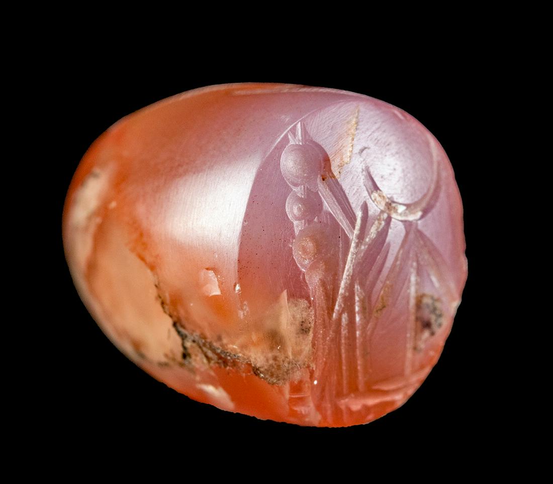 Mesopotamian Neo-Babylonian Carnelian Cone Seal: **Originally Listed At $400** Ancient Near East, Mesopotamia, Babylon, Neo-Babylonian Period, ca. 626 to 539 BCE. A hand-carved stamp seal bearing smooth, lustrous surfaces as well as a convex stamp f