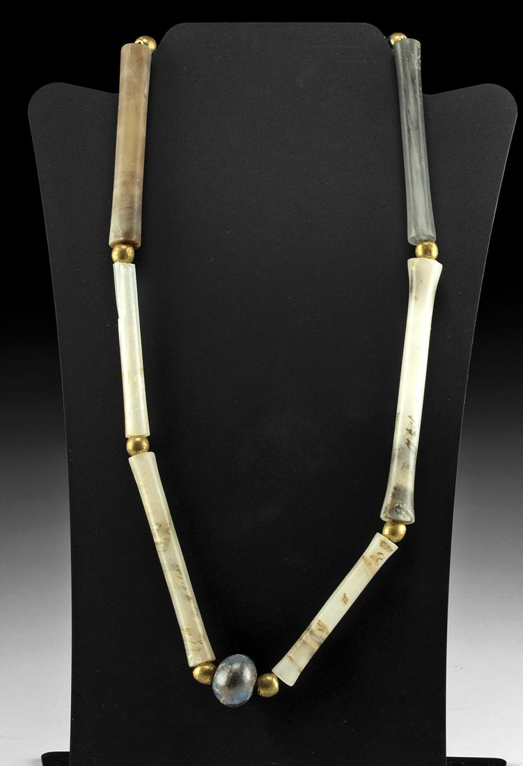 Necklace w/ Tairona Chalcedony, Sodalite & Brass Beads: Pre-Columbian, Colombia, Tairona culture, ca. 1000 to 1500 CE. This is a stunning and wearable necklace comprised of 9 ancient hand carved and polished chalcedony and sodalite stone beads, and 10 addi