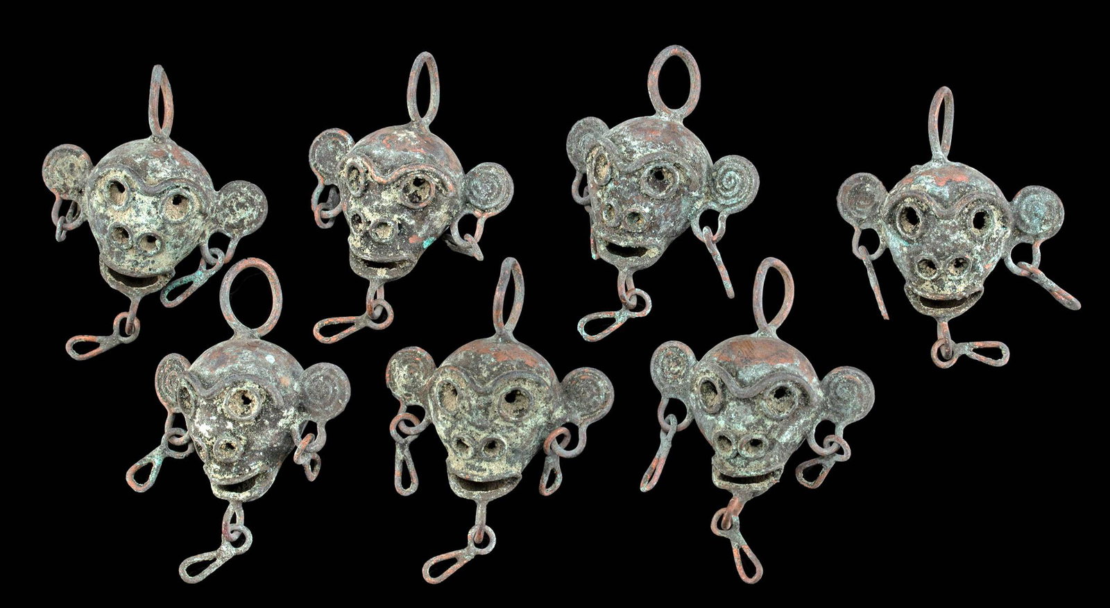 7 Mixtec Copper Pendants - Monkey Head Form (1 of 2)