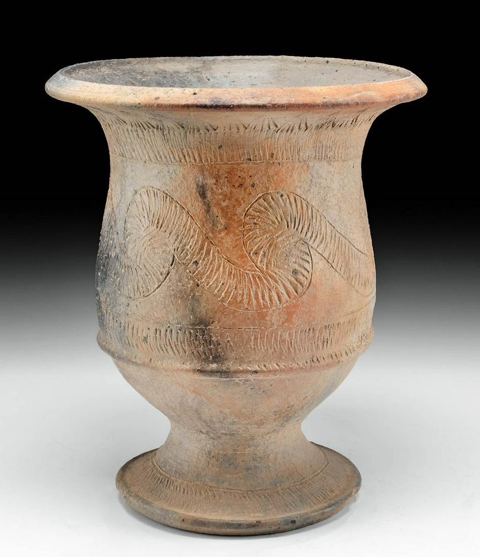 Tall Thai Ban Chiang Incised Pottery Jar, ex-Museum: Ancient Southeast Asia, Thailand, Ban Chiang, ca. 300 BCE. A hand-built pottery jar of a tall and dignified form with a wide foot, a broad piriform body with a rounded lower section, a gently tapered 